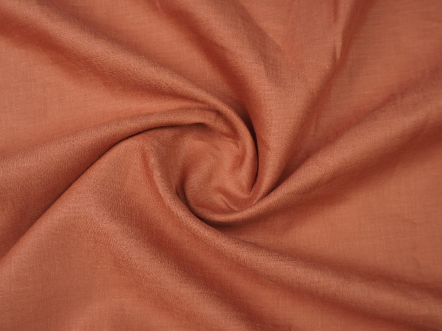 IMG-20260609-WA0037 Emerald by Burgoyne rust shade pure linen fabric now available at The Fashion Fabric
